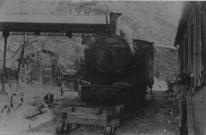 Front view of Mallet locomotive No. 324 at the Florac depot Front view of Mallet locomotive No. 324 at the Florac depot